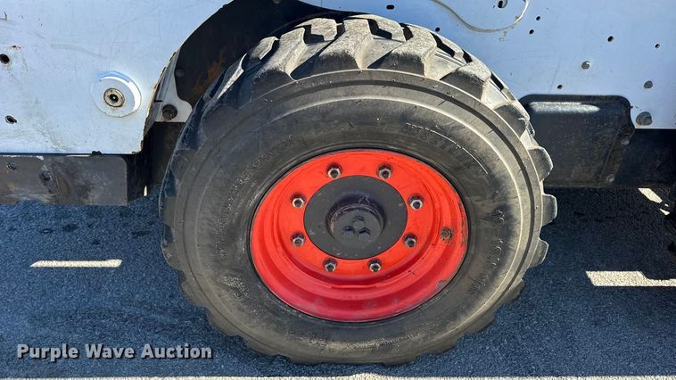 image for item EN0665 2014 Bobcat S750 skid steer loader