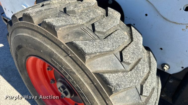 image for item EN0665 2014 Bobcat S750 skid steer loader