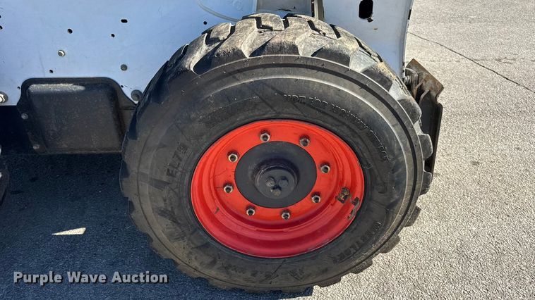 image for item EN0665 2014 Bobcat S750 skid steer loader