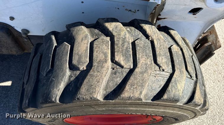 image for item EN0665 2014 Bobcat S750 skid steer loader