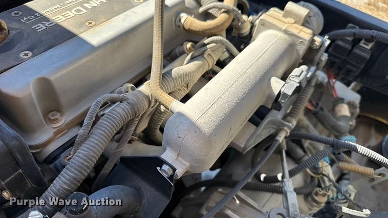 image for item EN0669 2015 John Deere Gator 825i utility vehicle