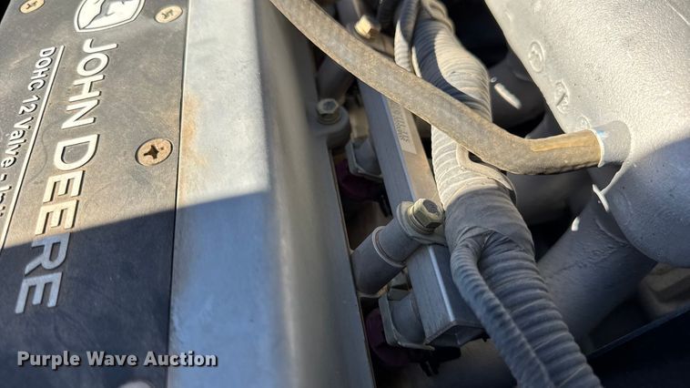 image for item EN0669 2015 John Deere Gator 825i utility vehicle