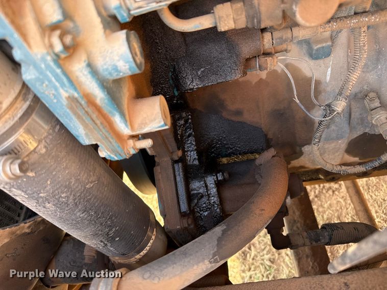 image for item EP0796 1999 International 4700 flatbed truck