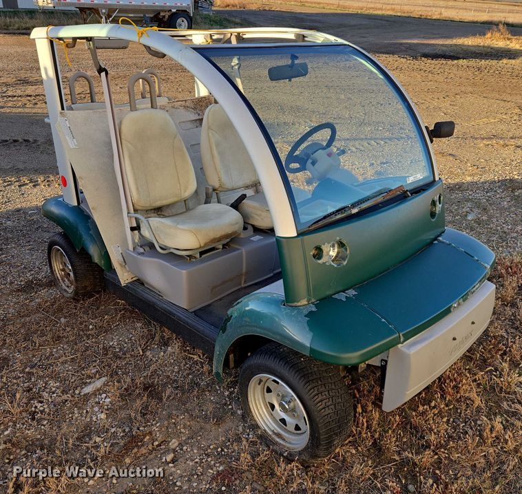image for item ES2528 2002 Ford Th!nk Neighbor golf cart