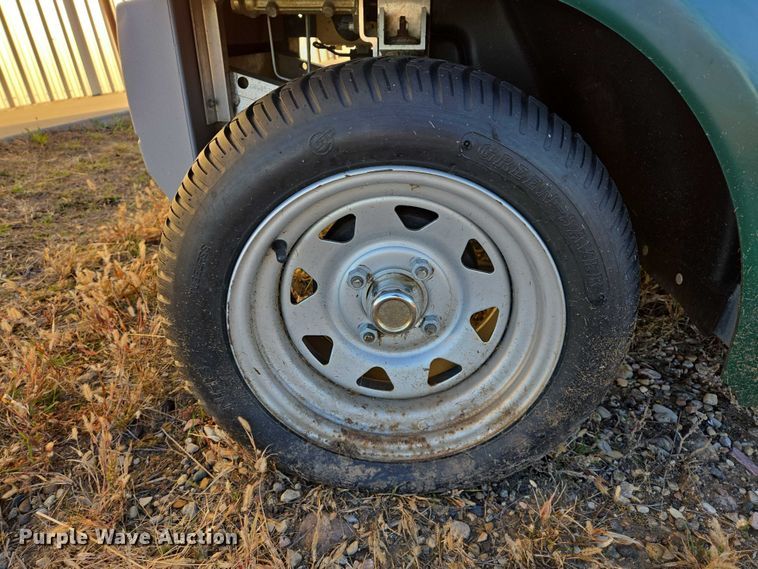 image for item ES2528 2002 Ford Th!nk Neighbor golf cart