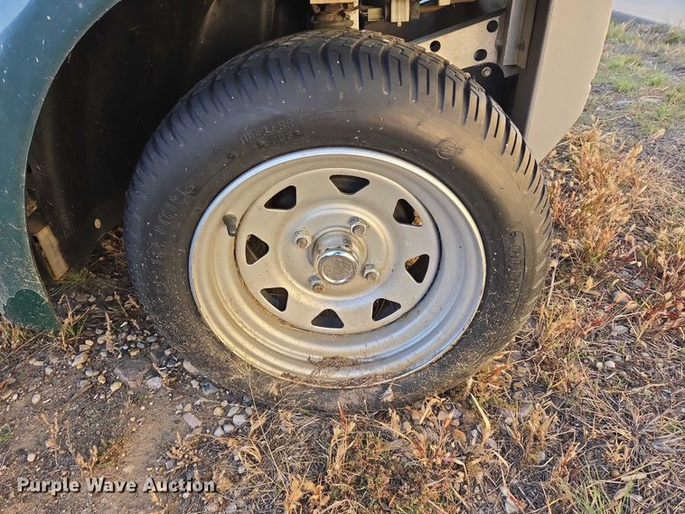 image for item ES2528 2002 Ford Th!nk Neighbor golf cart