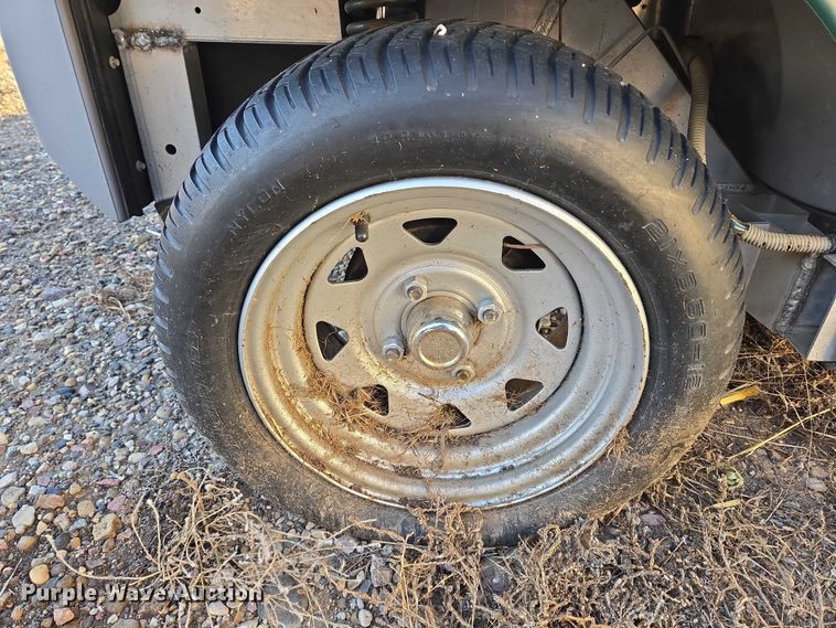 image for item ES2528 2002 Ford Th!nk Neighbor golf cart