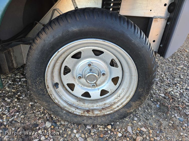 image for item ES2528 2002 Ford Th!nk Neighbor golf cart