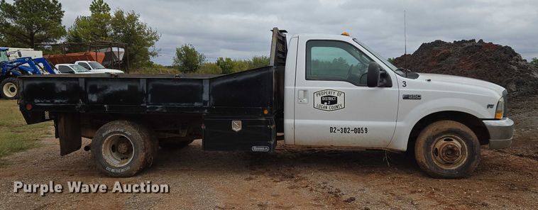 image for item EU3953 2001 Ford F350 Super Duty XLT flatbed pickup truck