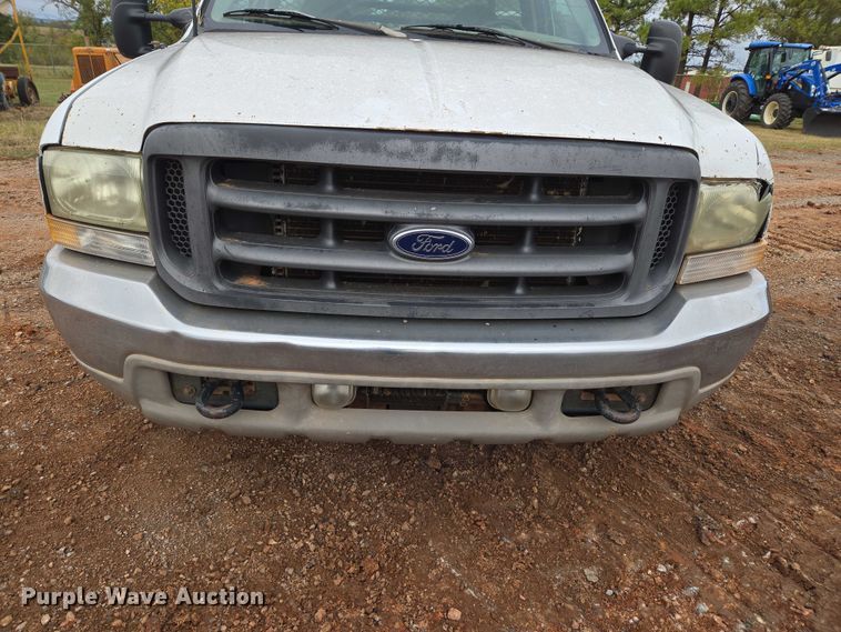 image for item EU3953 2001 Ford F350 Super Duty XLT flatbed pickup truck