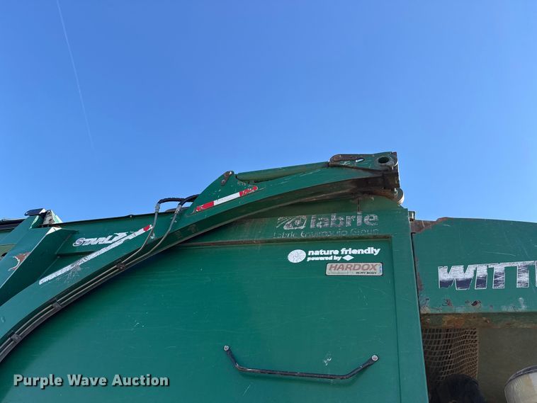 image for item EU5324 2015 Peterbilt 320 refuse truck