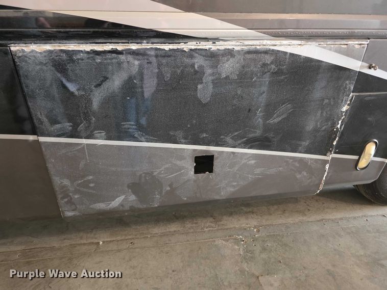 image for item FI0635 2004 Fleetwood Revolution RV