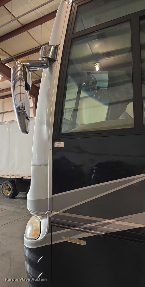 image for item FI0635 2004 Fleetwood Revolution RV