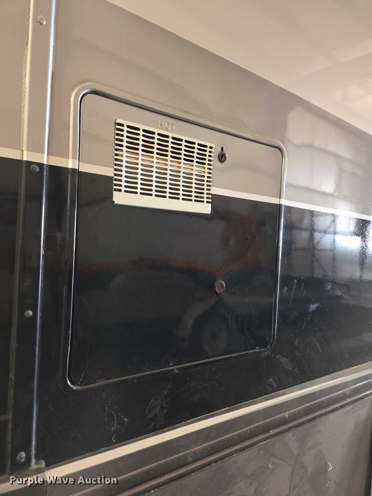 image for item FI0635 2004 Fleetwood Revolution RV