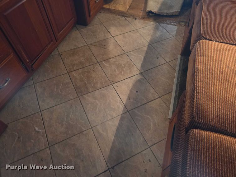 image for item FI0635 2004 Fleetwood Revolution RV