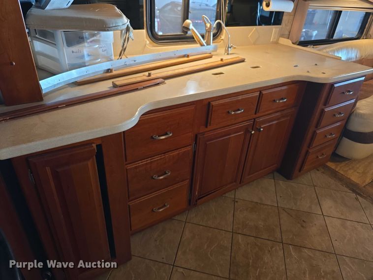 image for item FI0635 2004 Fleetwood Revolution RV