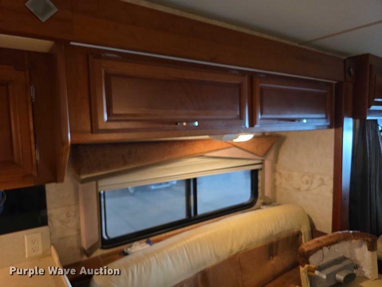 image for item FI0635 2004 Fleetwood Revolution RV