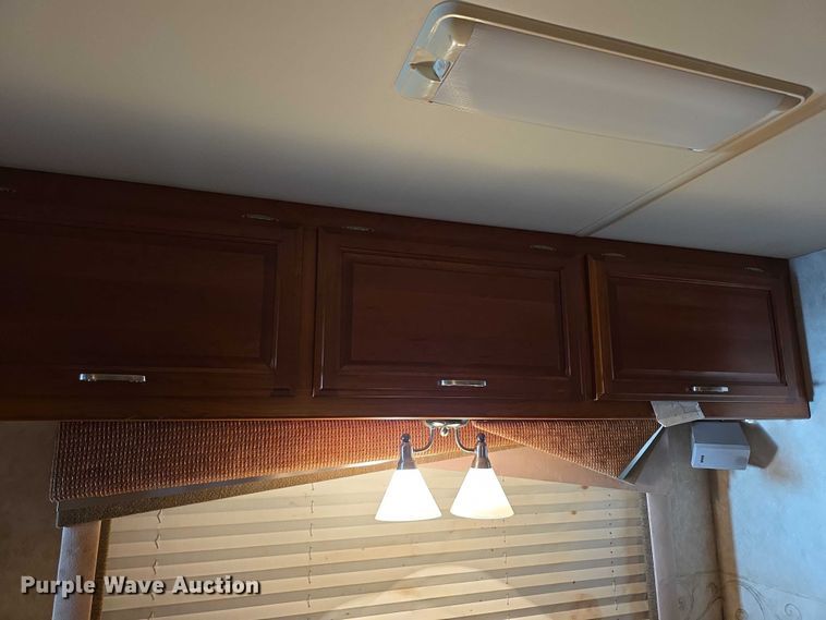 image for item FI0635 2004 Fleetwood Revolution RV