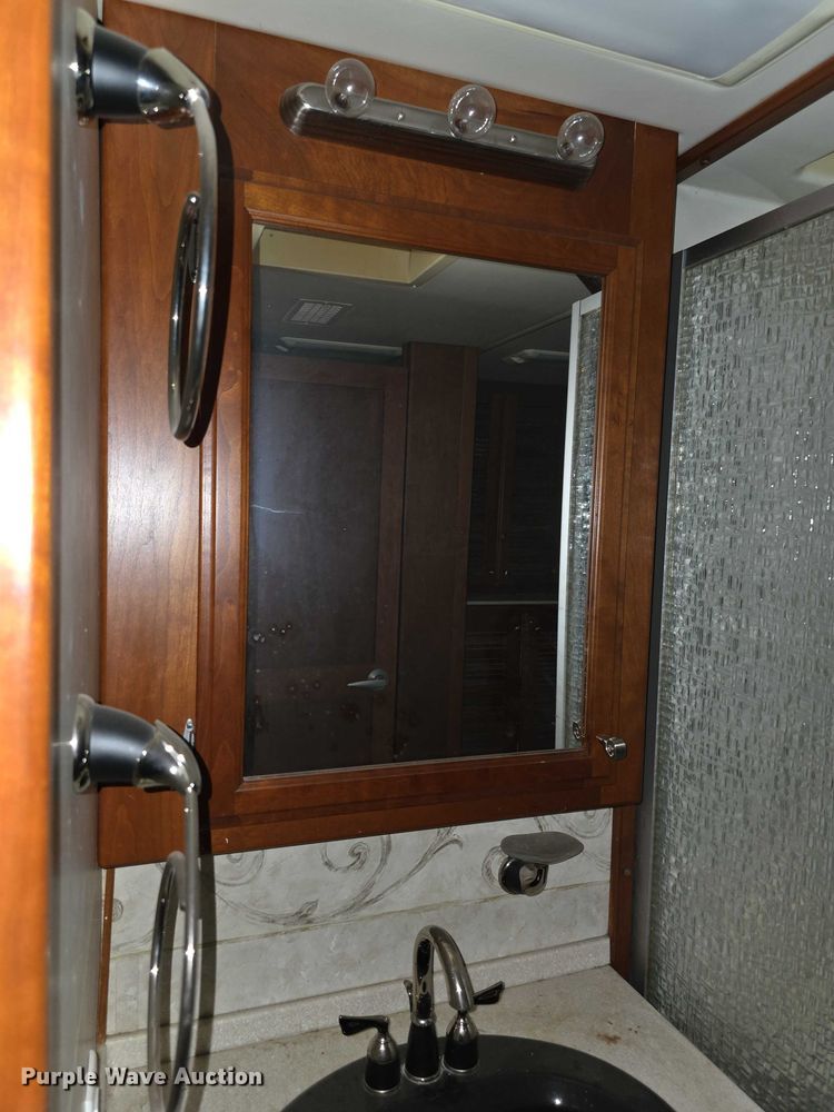 image for item FI0635 2004 Fleetwood Revolution RV