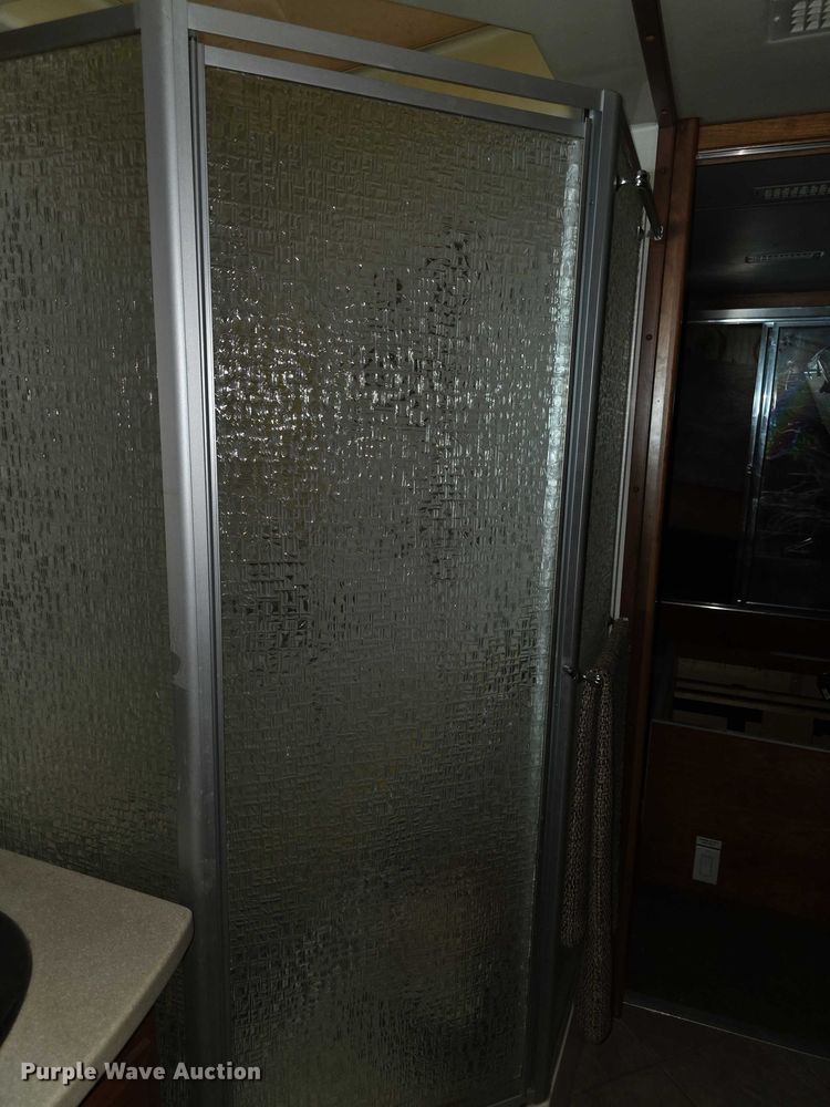 image for item FI0635 2004 Fleetwood Revolution RV