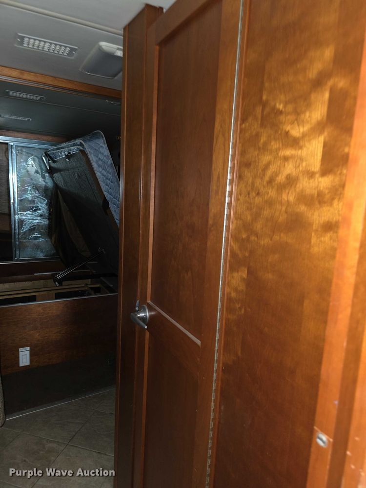 image for item FI0635 2004 Fleetwood Revolution RV