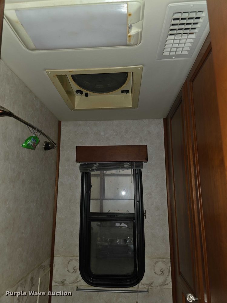 image for item FI0635 2004 Fleetwood Revolution RV