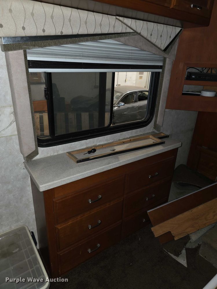 image for item FI0635 2004 Fleetwood Revolution RV