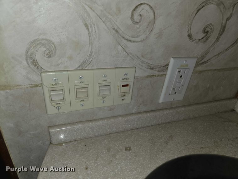 image for item FI0635 2004 Fleetwood Revolution RV