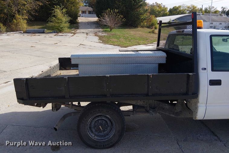 image for item FK0510 1997 GMC Sierra 2500HD flatbed pickup truck