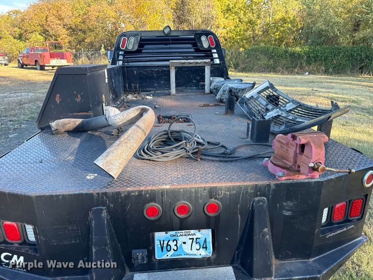 image for item DJ7877 2012 Dodge Ram 5500 Crew Cab flatbed truck