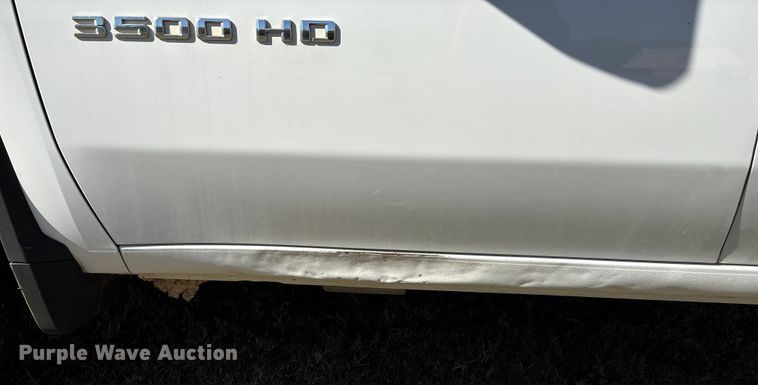 image for item DJ7953 2022 Chevrolet Silverado 3500HD  Crew Cab flatbed pickup truck