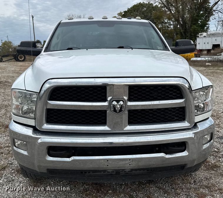 image for item DW6648 2018 RAM 3500HD Crew Cab flatbed pickup truck