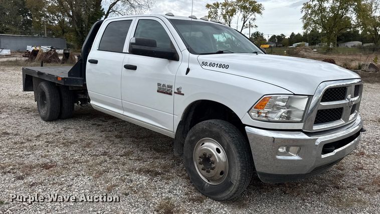 image for item DW6648 2018 RAM 3500HD Crew Cab flatbed pickup truck