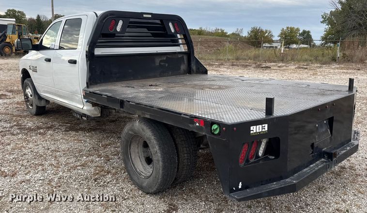 image for item DW6648 2018 RAM 3500HD Crew Cab flatbed pickup truck