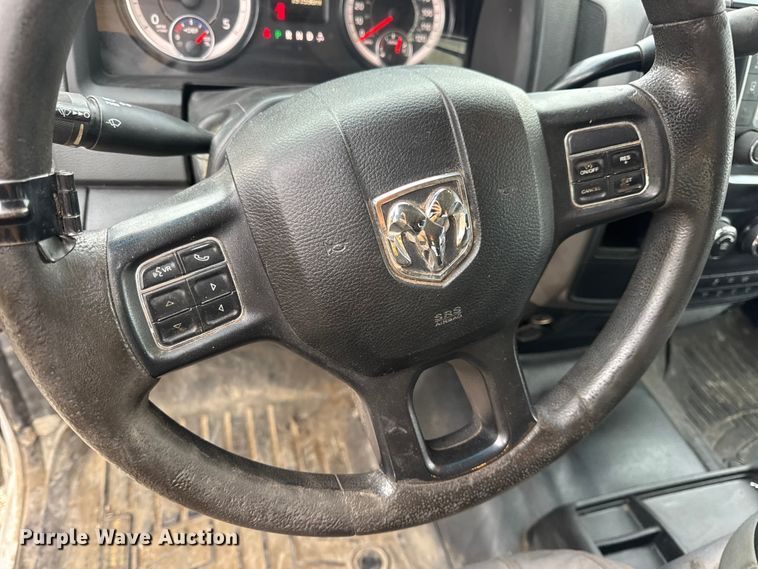 image for item DW6648 2018 RAM 3500HD Crew Cab flatbed pickup truck