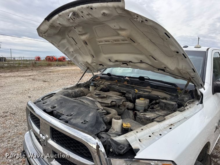 image for item DW6648 2018 RAM 3500HD Crew Cab flatbed pickup truck