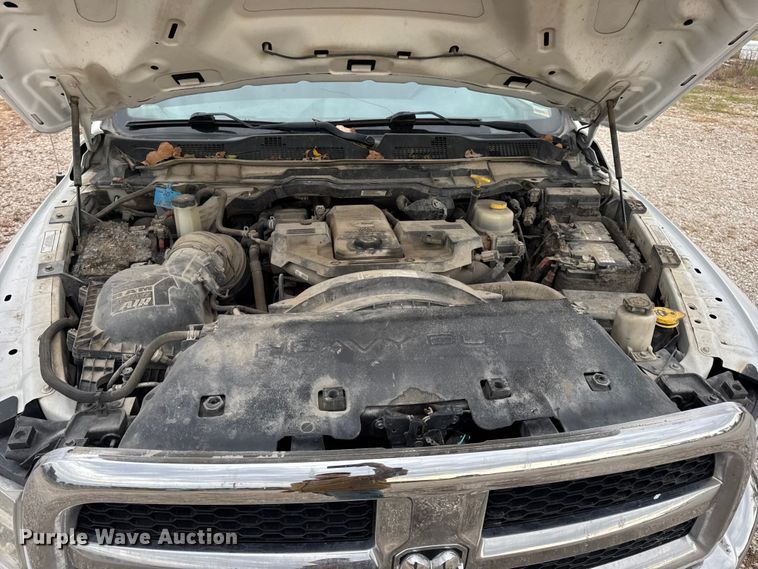 image for item DW6648 2018 RAM 3500HD Crew Cab flatbed pickup truck