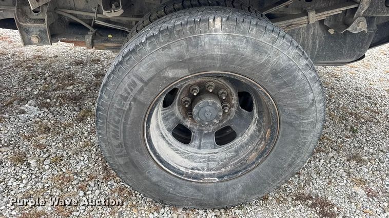 image for item DW6648 2018 RAM 3500HD Crew Cab flatbed pickup truck