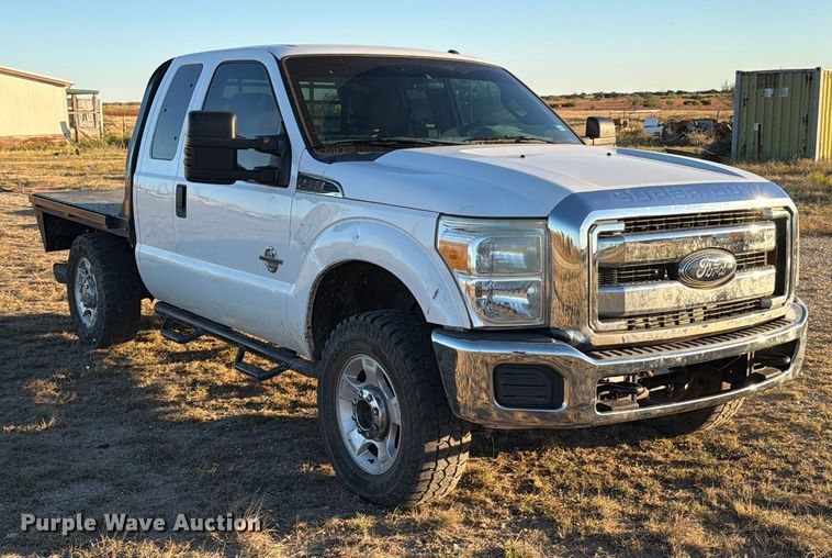 image for item DX5867 2015 Ford F250 Super Duty XLT SuperCab flatbed pickup truck
