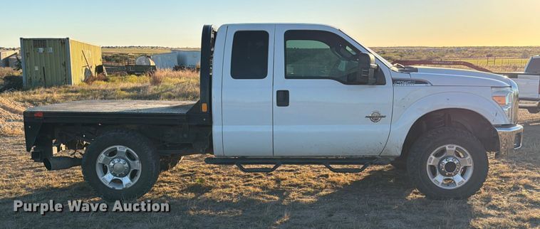 image for item DX5867 2015 Ford F250 Super Duty XLT SuperCab flatbed pickup truck