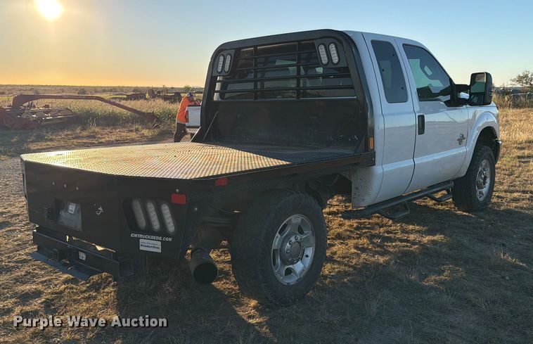 image for item DX5867 2015 Ford F250 Super Duty XLT SuperCab flatbed pickup truck