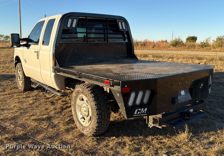 image for item DX5867 2015 Ford F250 Super Duty XLT SuperCab flatbed pickup truck
