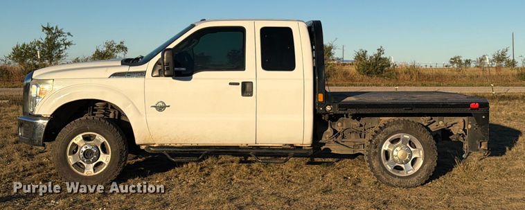 image for item DX5867 2015 Ford F250 Super Duty XLT SuperCab flatbed pickup truck