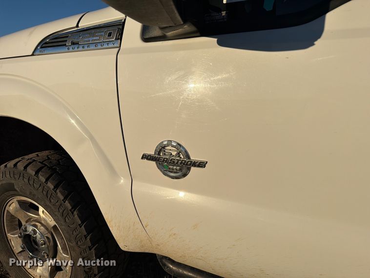 image for item DX5867 2015 Ford F250 Super Duty XLT SuperCab flatbed pickup truck