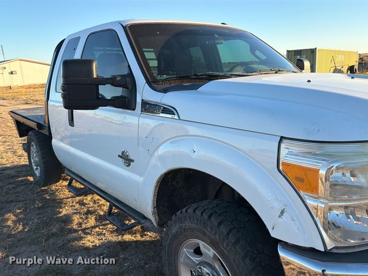 image for item DX5867 2015 Ford F250 Super Duty XLT SuperCab flatbed pickup truck