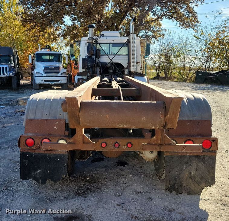 image for item DX6603 1986 White Xpeditor WX roll-off container truck