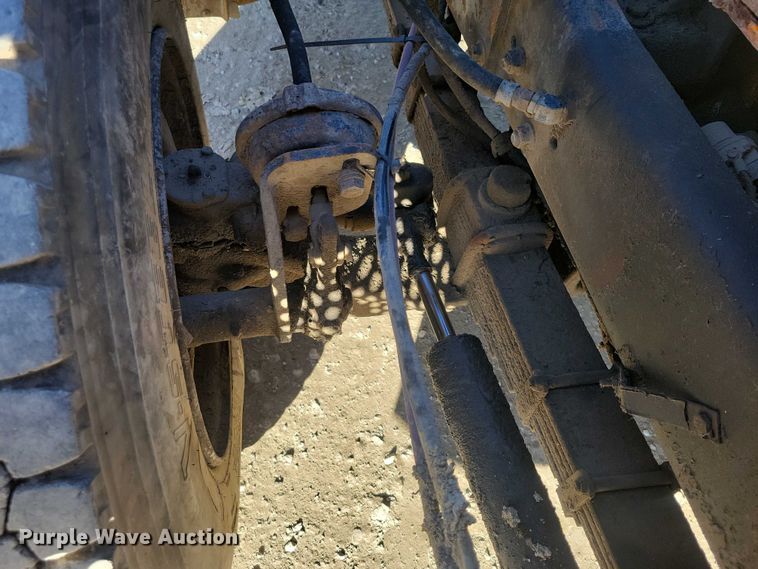 image for item DX6603 1986 White Xpeditor WX roll-off container truck