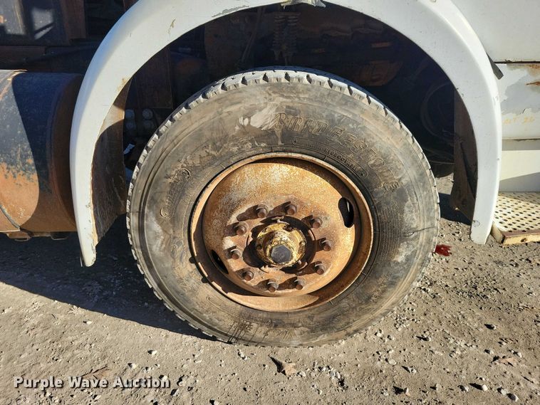 image for item DX6603 1986 White Xpeditor WX roll-off container truck