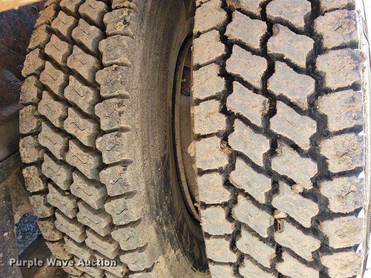 image for item DX6603 1986 White Xpeditor WX roll-off container truck