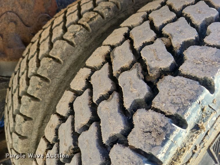 image for item DX6603 1986 White Xpeditor WX roll-off container truck